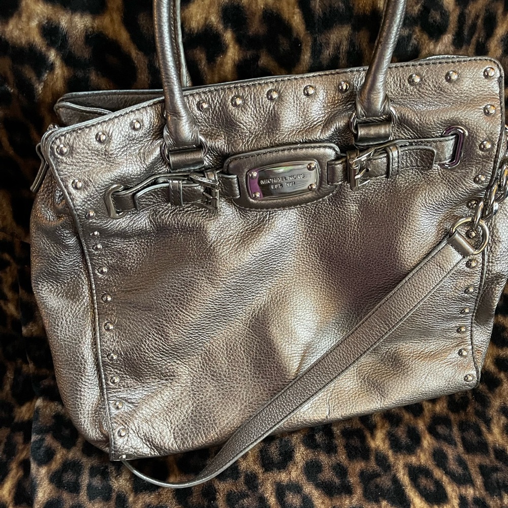 Silver Metallic Leather large handbag gently used Michael Kors.